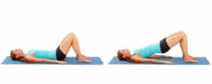 Woman demonstrating a method to exercise your back and abs by arching your back and pushing your pelvis upwards