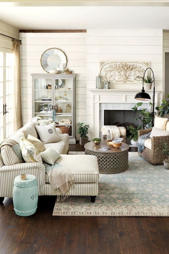 A lounge room containing a number of antiques